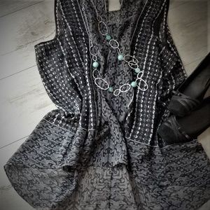 Kenneth Cole - Sleeveless hi-low unique blouse!